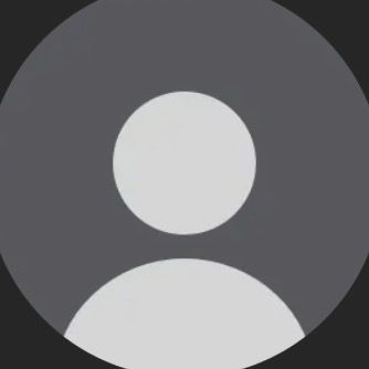 T.